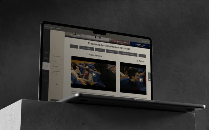 Laptop showing a 'TAPE' website page.